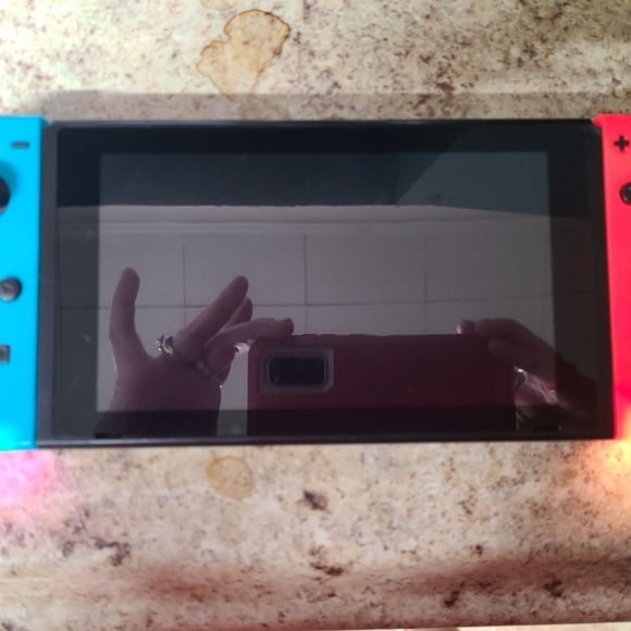 Nitendo switch with doc and charger